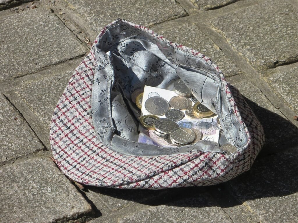 busker, hat, money